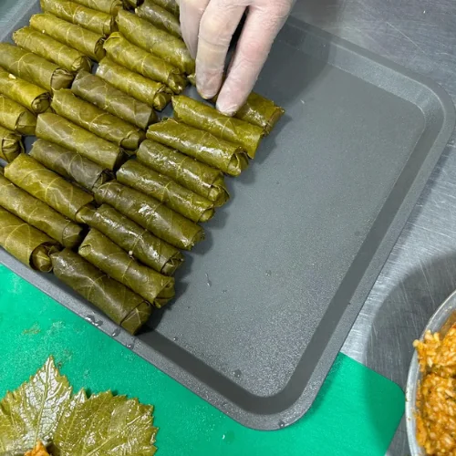 Stuffed Grape Leaves - Traditional grape leaves stuffed with rice and herbs.